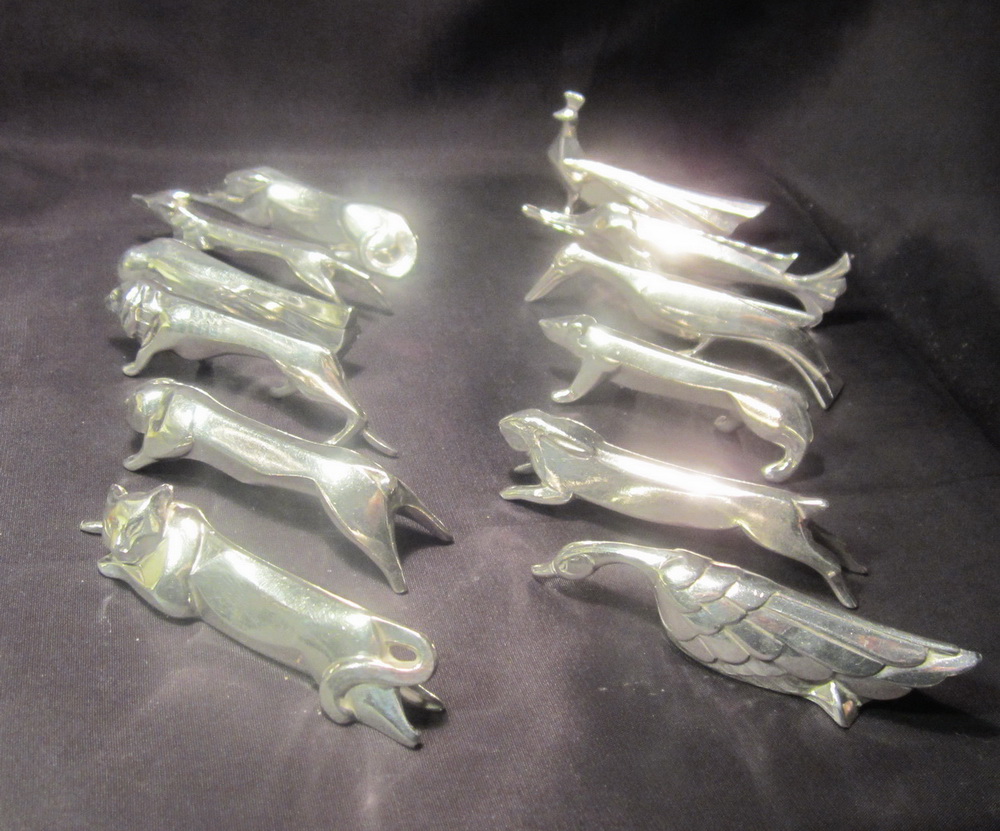 Set of 12 art deco Gallia knife rests, Christofle /  Marcel Edouard SANDOZ. 