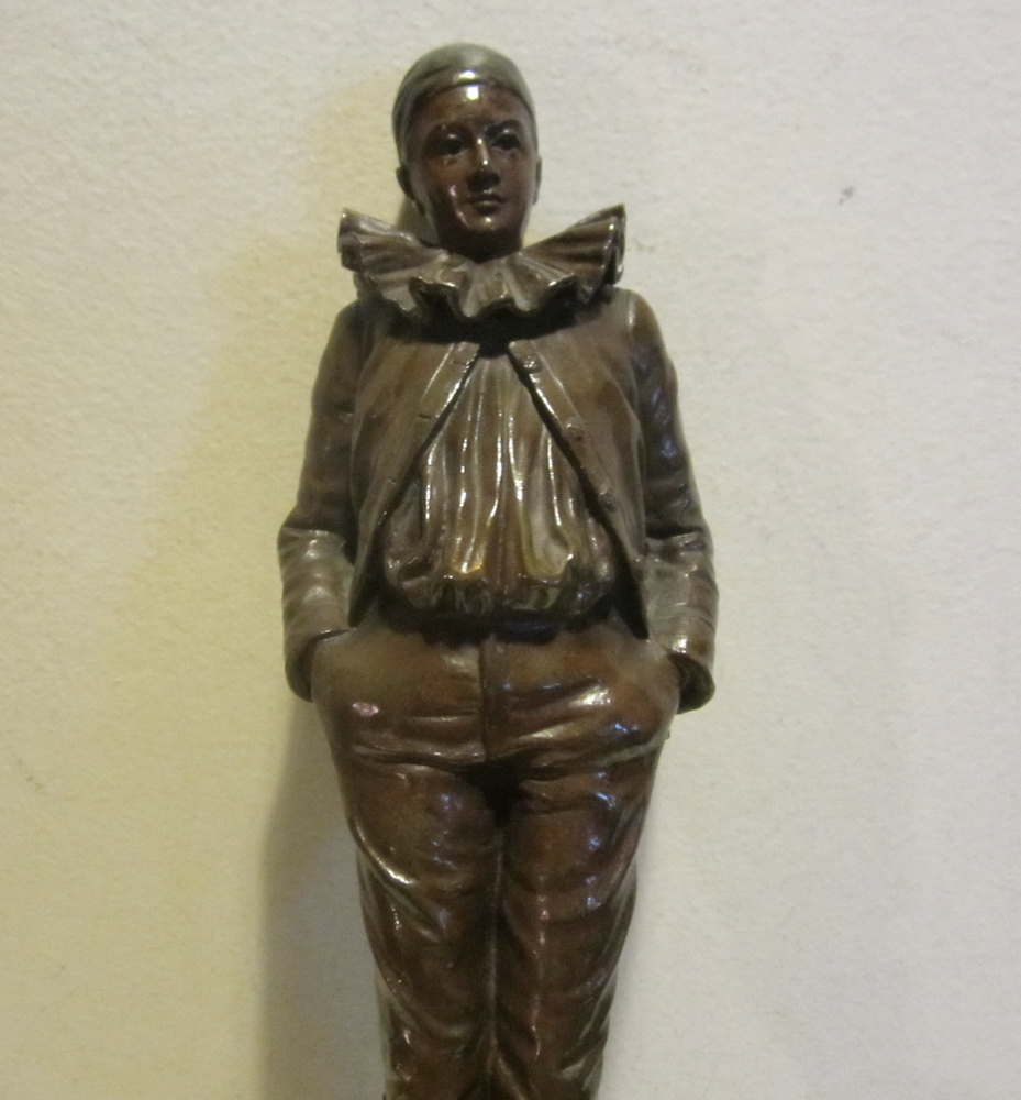 Antique bronze sculpture of a Pierrot by Jean Garnier, on an intricately decorated marble base. 