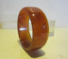 vintage chunky amber coloured bakelite bracelet. ca  3 cm wide