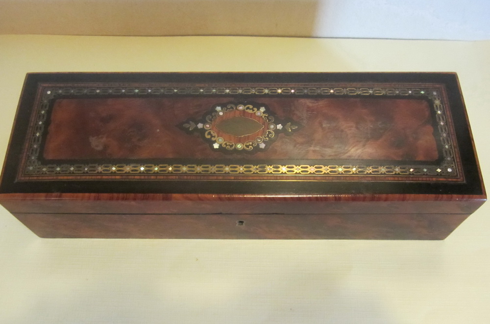 Antique French wooden jewelry box with a silk moir lining